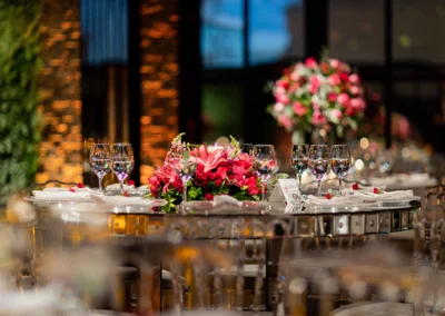Table setting and flower arrangements at formal event.